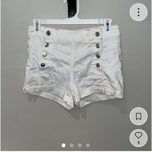 Shorts with embroidered buttons
